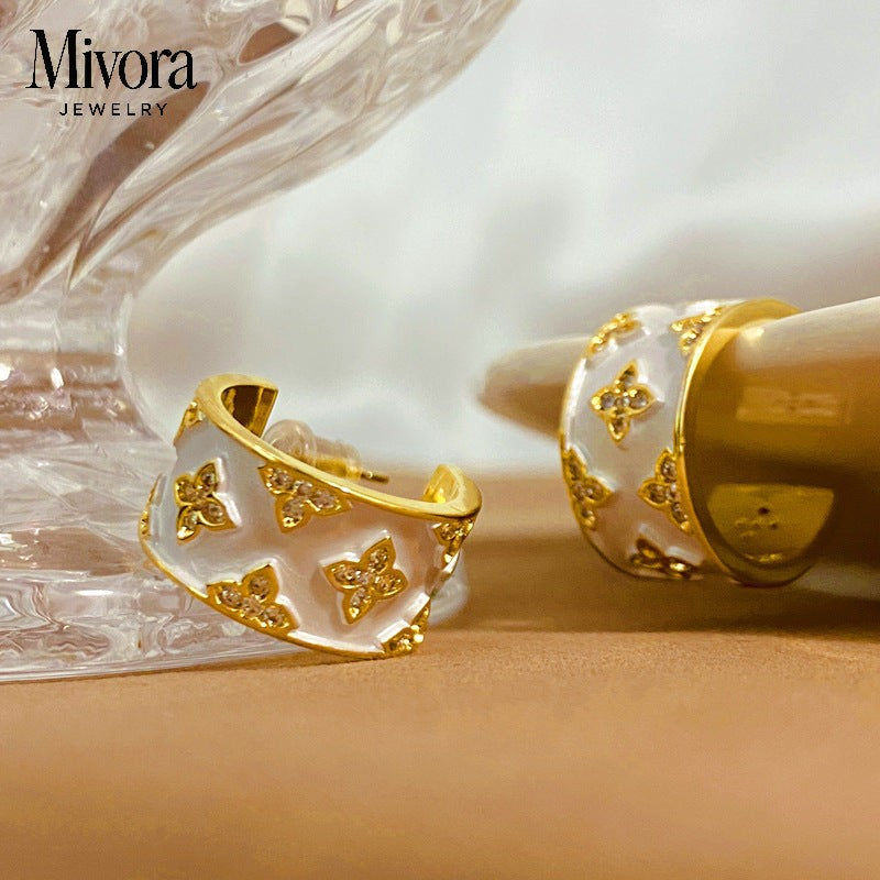 FOUR-LEAF CLOVER EARRINGS + RINGS