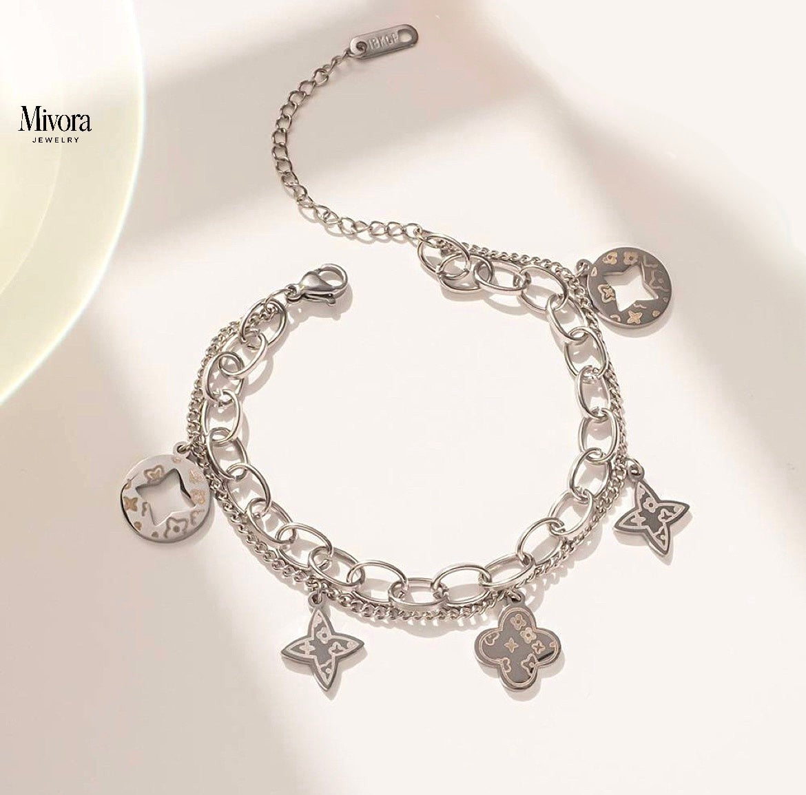 FOUR LEAF CLOVER CHARMS BRACELET - GOLD AND SILVER